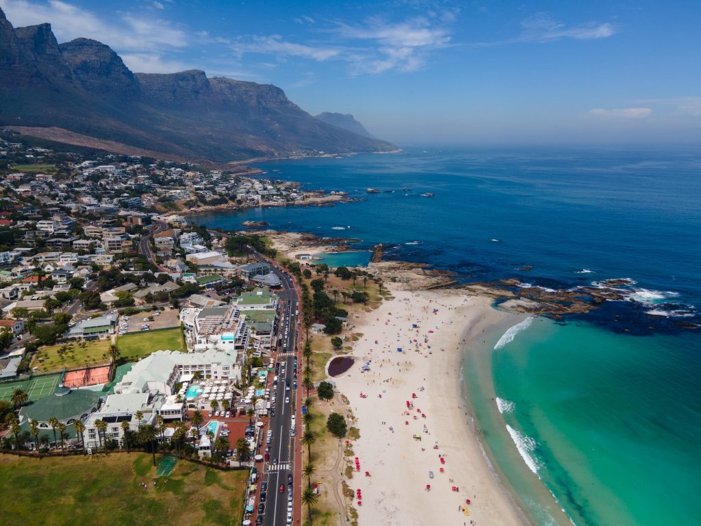 view from The Rock viewpoint in Cape Town over Campsbay, view over Camps Bay with fog over the ocean